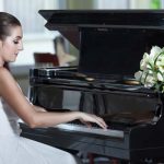 Bride playing piano